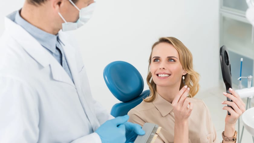 Dentist reviewing an implant treatment plan with a patient